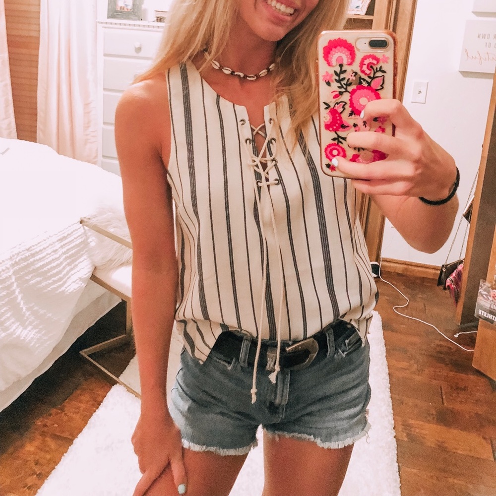 White and navy blue stripped lace up tank top !!
